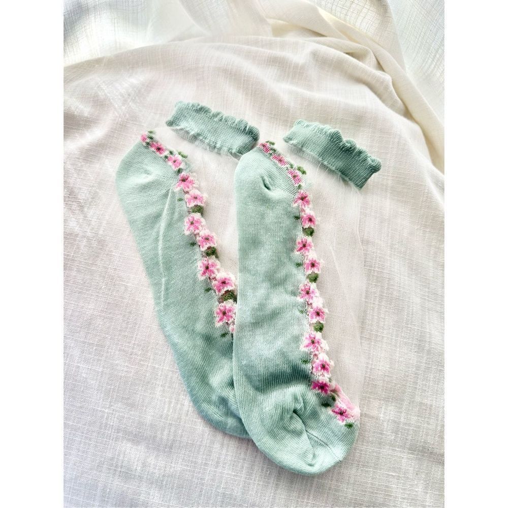 Light green sheer socks with pink flowers